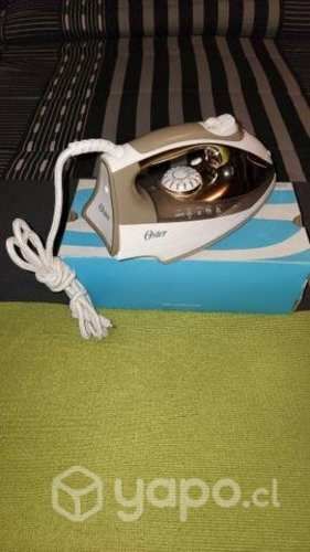 Plancha a vapor oster teflon