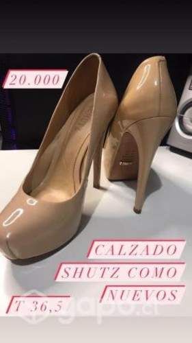 Tacos Shutz como nuevos con bolsa protectora