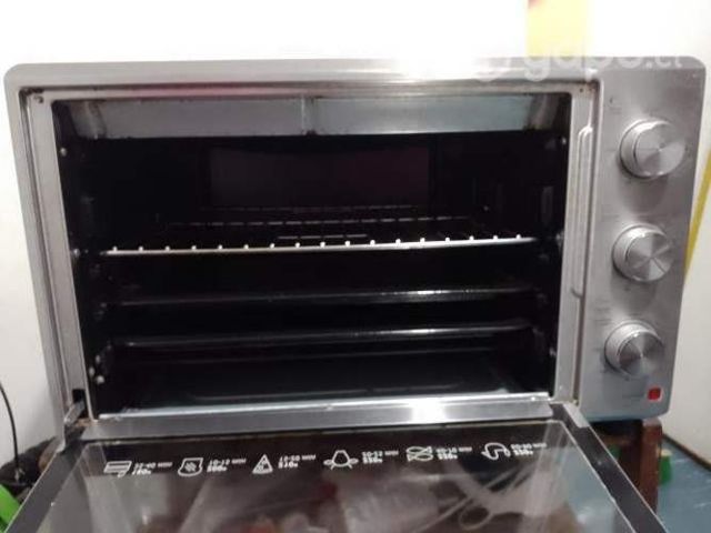 Por motivo de viaje,horno eléctrico