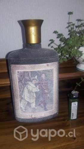 Bella botella para colección con textura arena