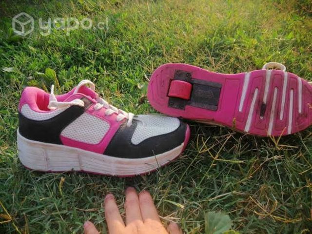 Zapatillas rosa con rueda