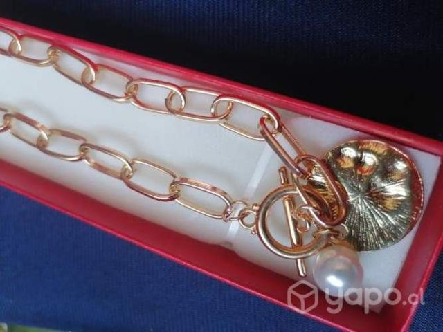 Set collar pulsera fantasía fina.