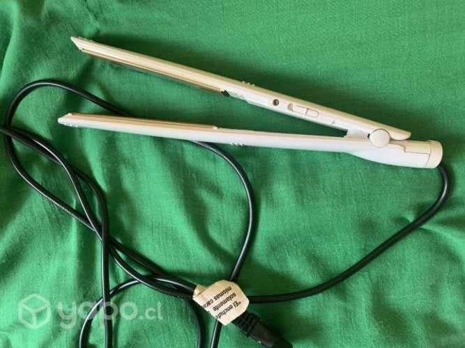 Alisadora de pelo funcionando en perfecto estado