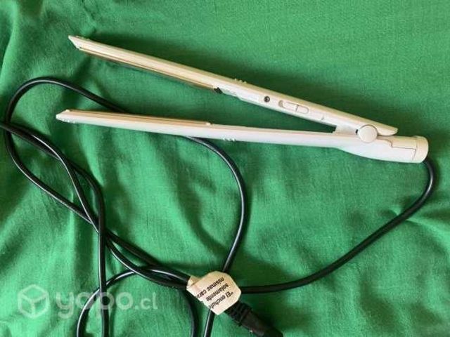 Alisadora de pelo funcionando en perfecto estado