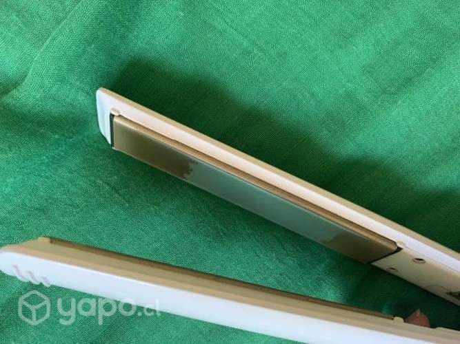 Alisadora de pelo funcionando en perfecto estado