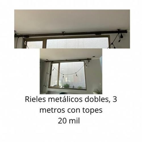 Rieles metálicos como nuevos