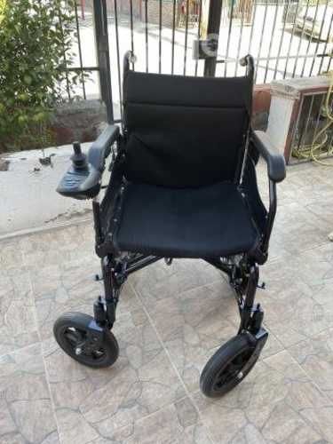 Silla de ruedas eléctrica y cojín antiescaras