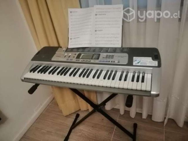 Teclado casio lk 100 impecable con atril