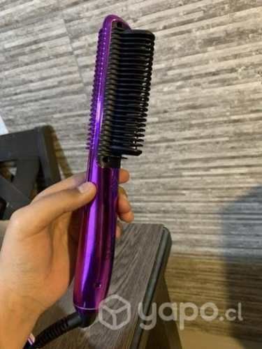 El cepillo para el cabello de cerámica multiusos
