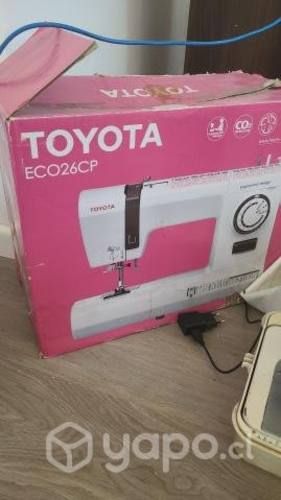 Maquina de coser nueva en caja