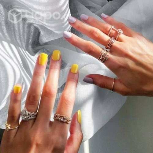 Uñas postizas con adhesivo patentado