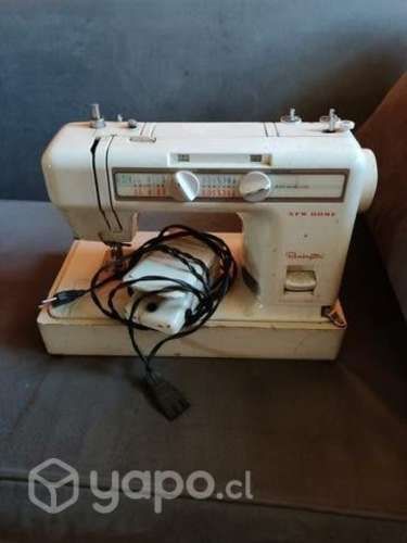 Máquina Remington funcionando de casa