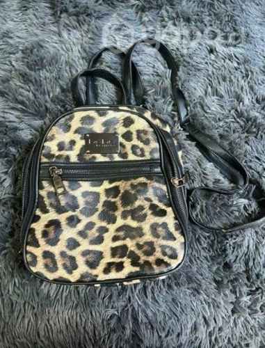 Mochila marca bebe animal print