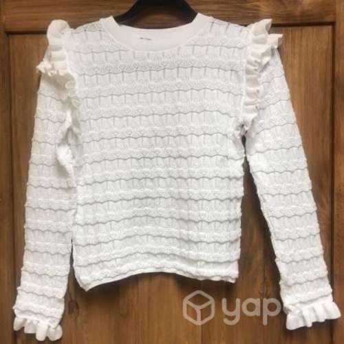 Chaleco ZARA con vuelos