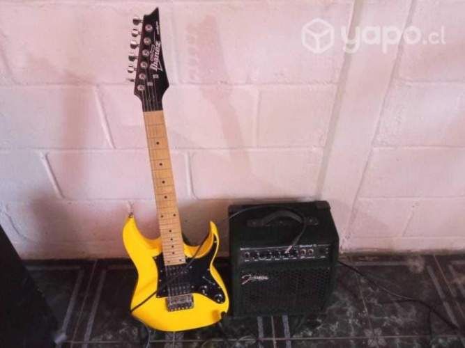 Guitarra elecrtica ibañez +amplificador y clabes