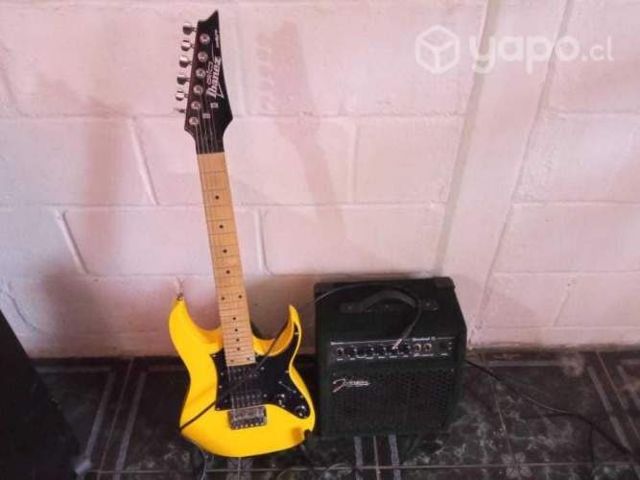 Guitarra elecrtica ibañez +amplificador y clabes