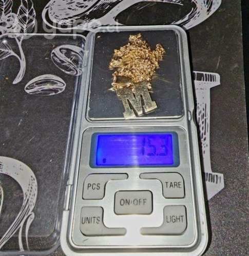 Cadena y letra M de oro 18k