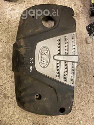 Tapa de motor kia río 2003
