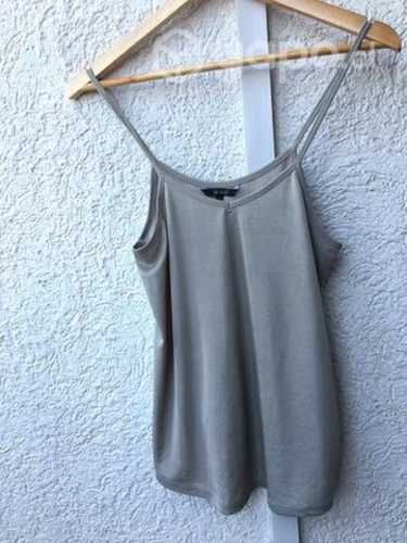 Polera tiritas con leve brillo talla M