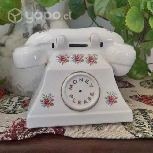 Antiguo telefono alcancia inglés