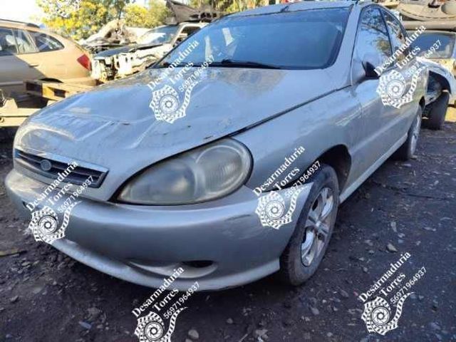 Tapabarro Kia rio 2001