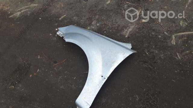 Tapabarro lh original kia río jb 2011