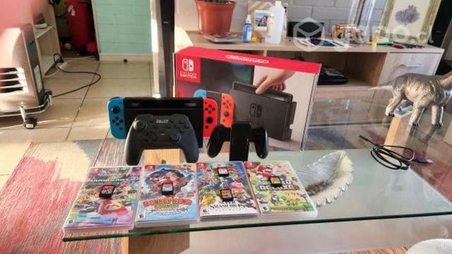 Nintendo Switch + 5 juegos + control extra