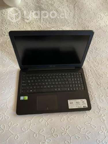 Notebook ASUS con accesorios