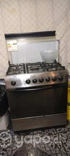 Cosina con chispero, luz (poco uso.)