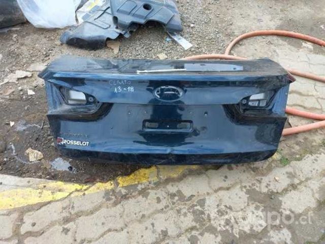 Maleta Kia cerato 2013 2018 Original min detallito