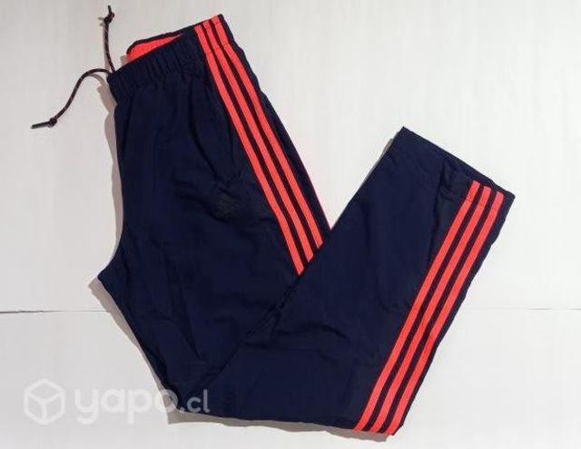 PANTALON DE BUZO ADIDAS color AZUL rayas rojas