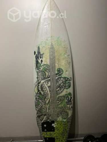 Tabla de surf y traje