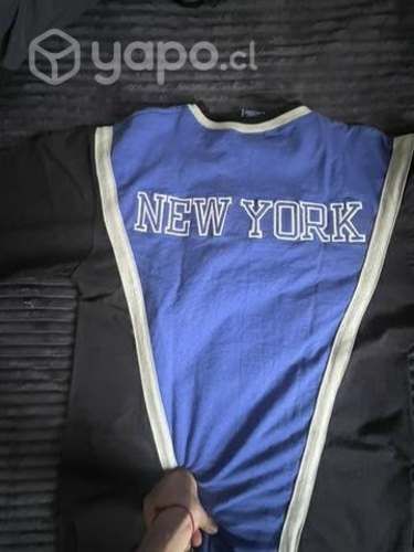 Polera champion talla en la foto