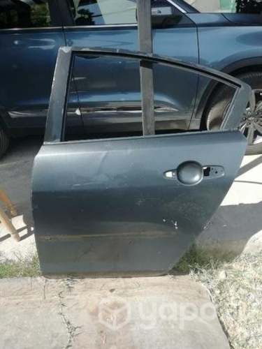 Puerta trasera izq Mazda 
