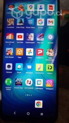 celular en excelente estado cargador