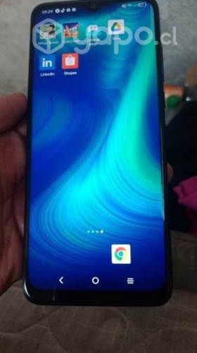 celular en excelente estado cargador