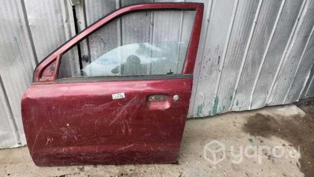 Puerta delantera izquierda suzuki alto 2013