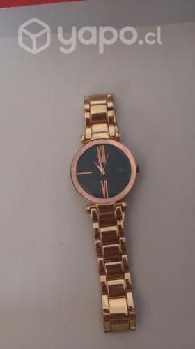 Reloj de oro fantasioso
