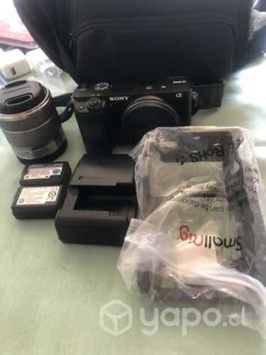 Sony A6000 seminueva , lente 16-50 , y otros