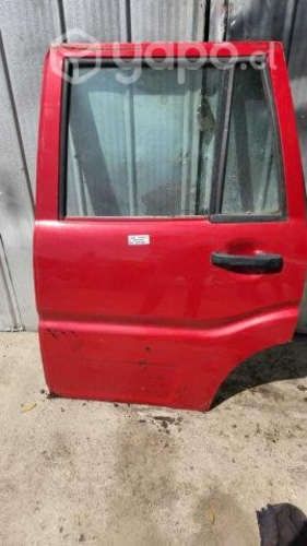 Puerta trasera izquierda mahindra 2017