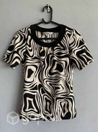 Polera, un básico en talla S (34)