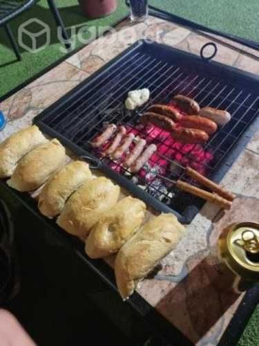 Mesa brasero para terraza en fierro y cerámica