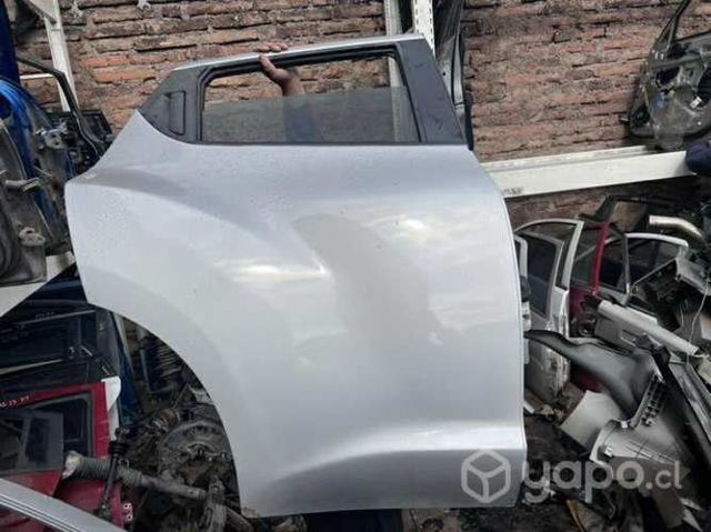 Puerta trasera derecha Nissan jume