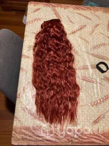 Extensiones de cabello rojizo