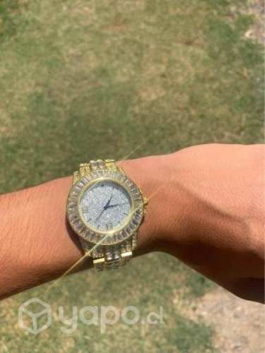 Reloj de hombre o mujer dorado