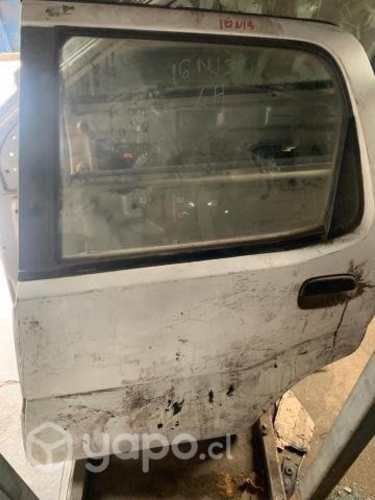 Puerta trasera izquierda Suzuki Ignis 2003