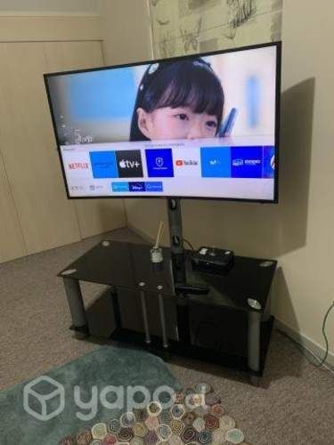 Rack de television negro de vidrio