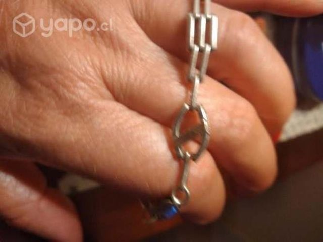 Pulsera de plata con pequeñas láminas de oro