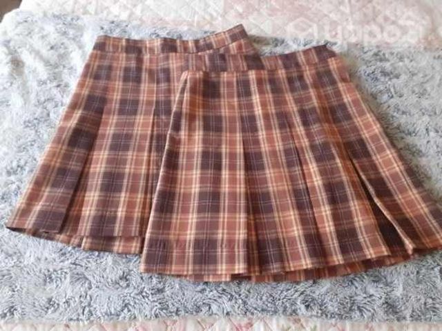 2 faldas nuevas T.10 Sagrado Corazon