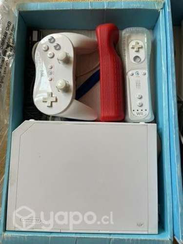 Wii con dos controles y 3 juegos